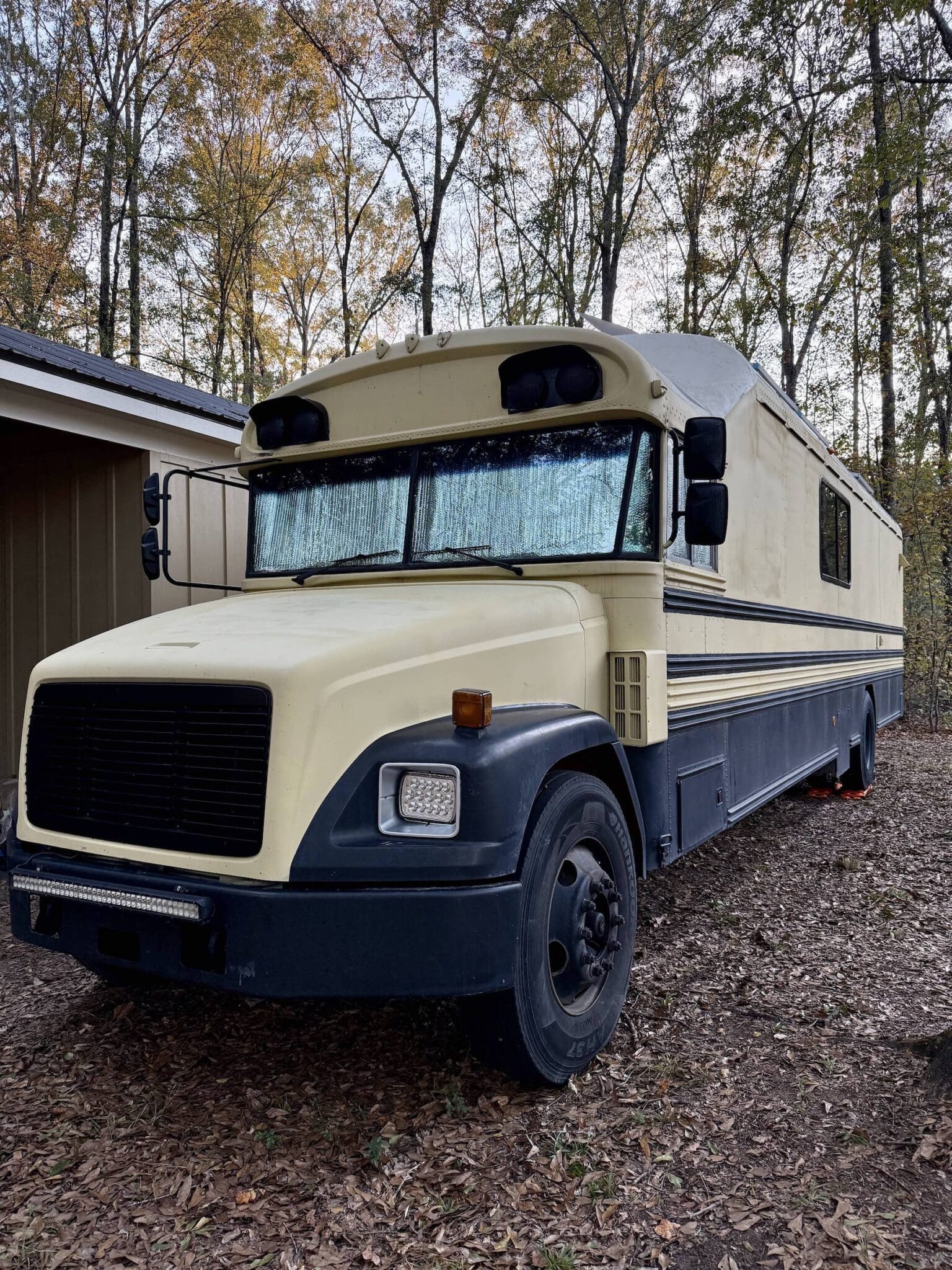 Converted school bus driver side exterior view
