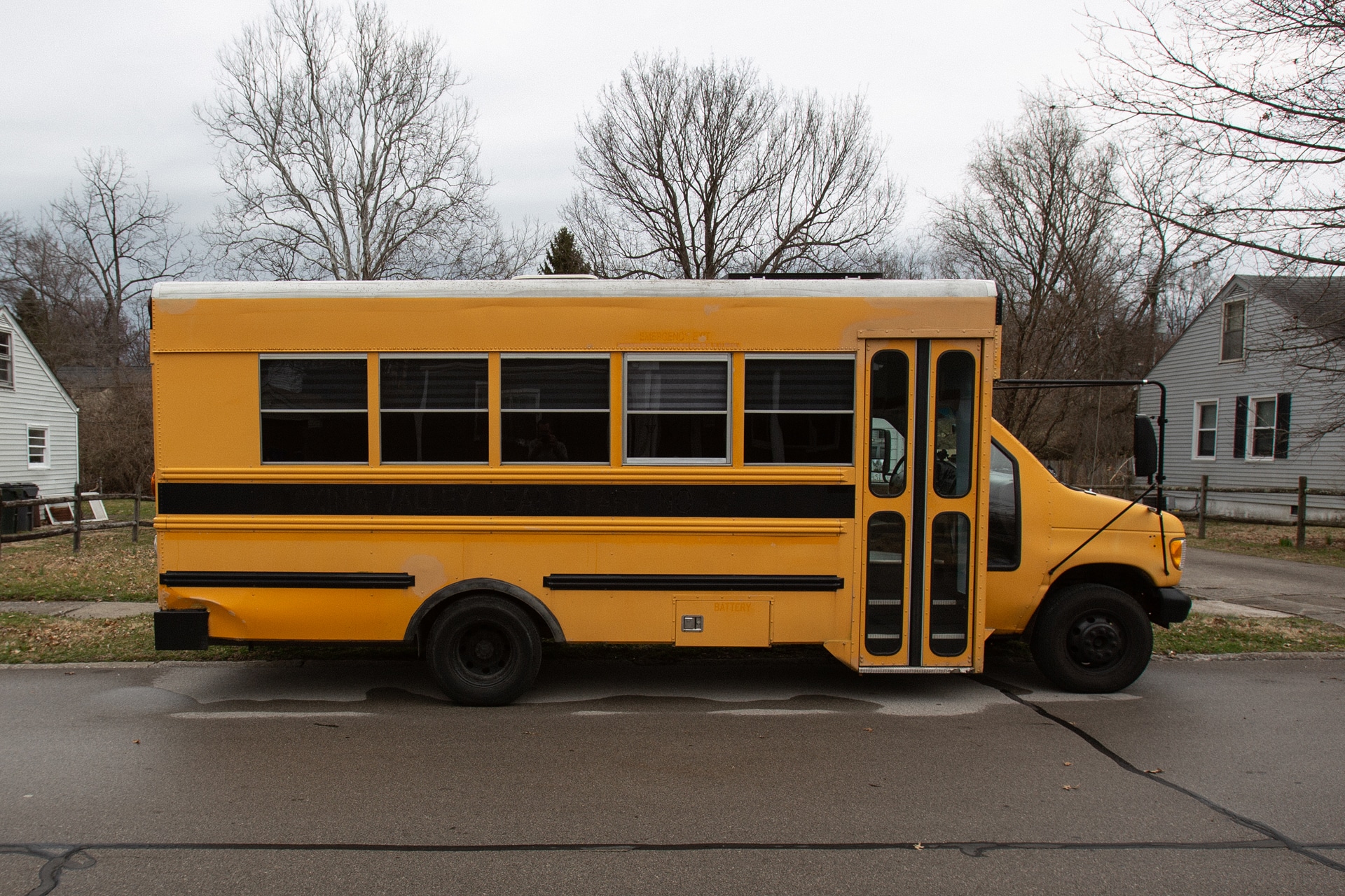 Is this a raised roof bus or are you very short?