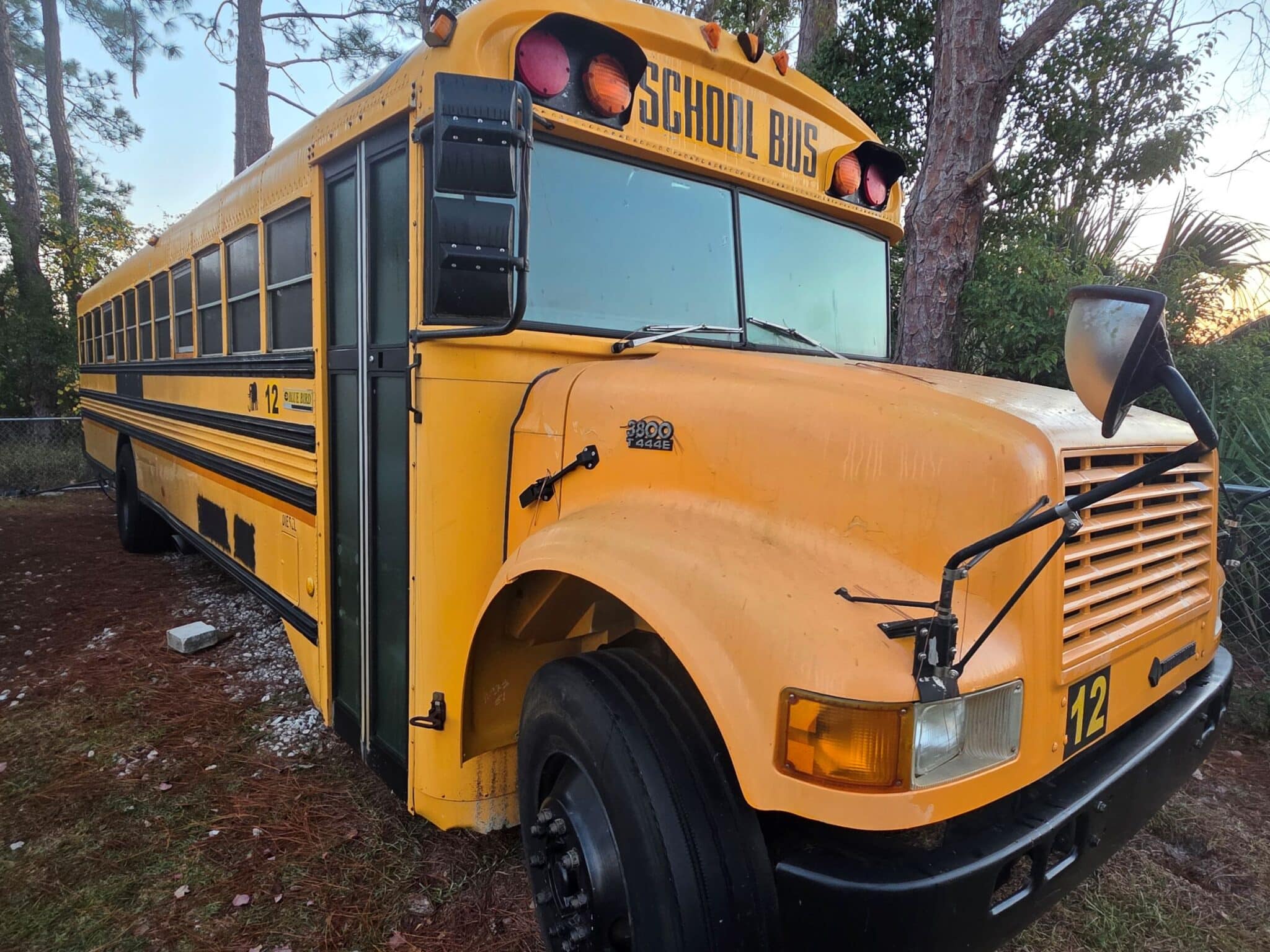 Yellow school bus parked and ready for conversion purchase